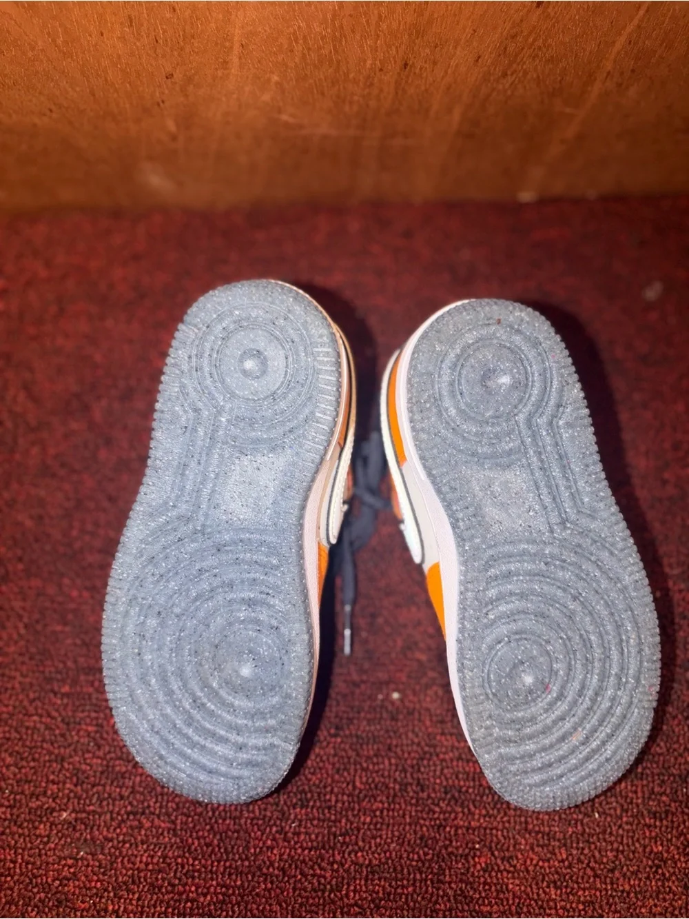 Nike Kids Orange and Gray Low-Top Sneakers with Smiley Heel